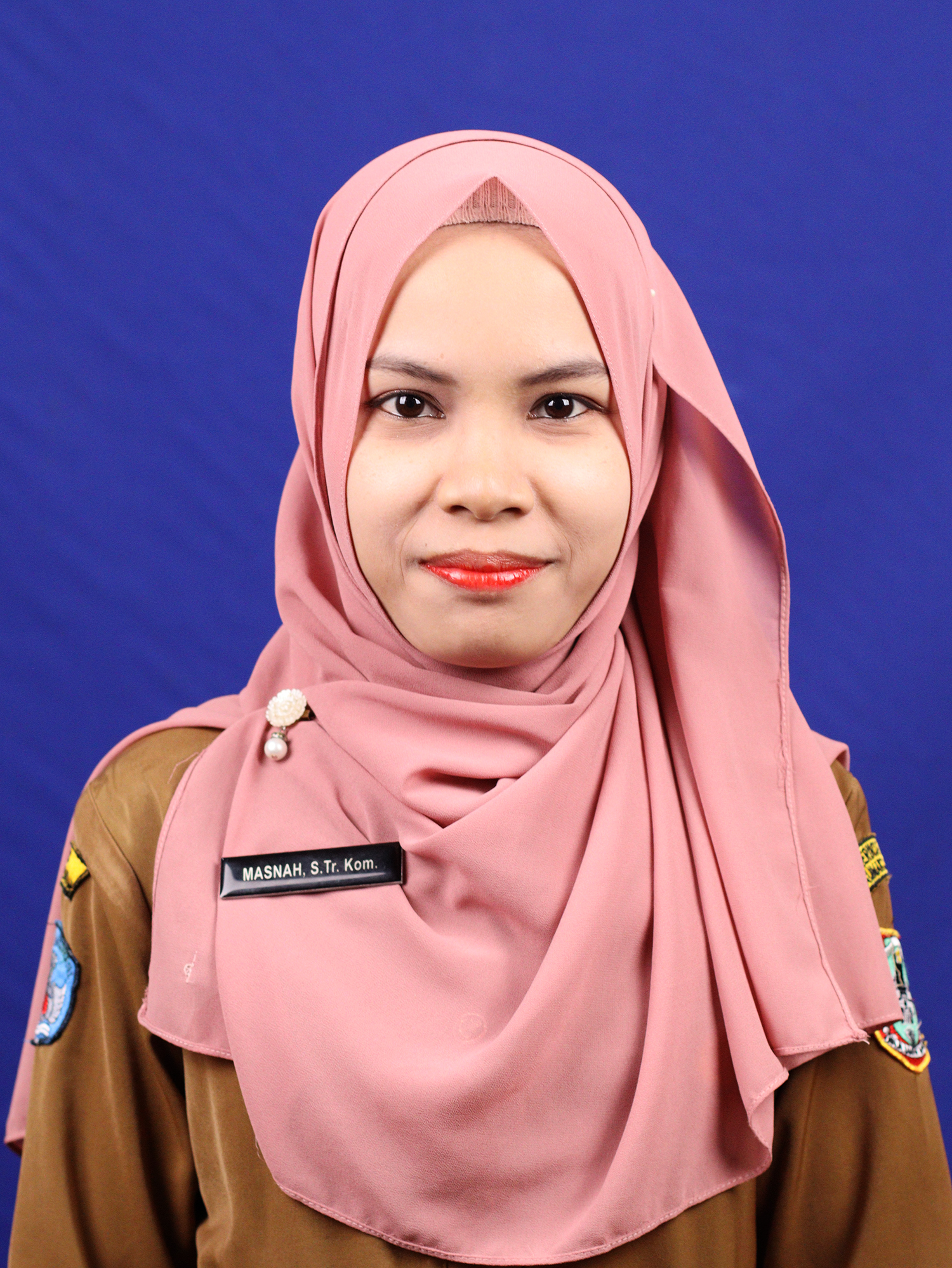 Foto Masnah, S.Tr.Kom